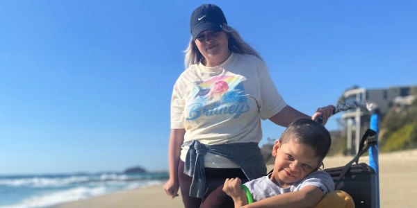 Mom with son on beach
